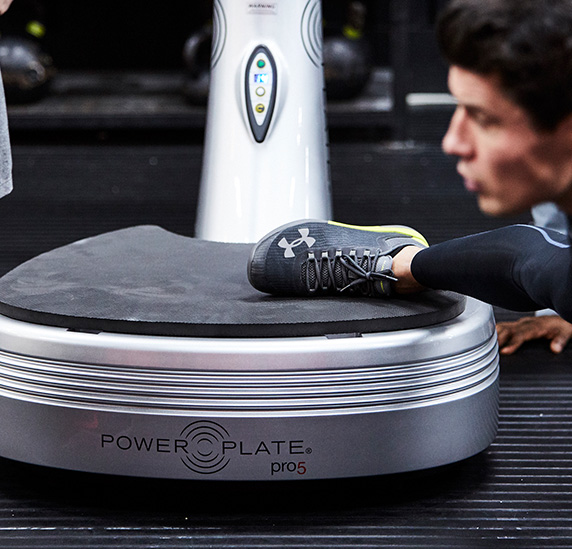 A Power plate user working out on Power Plate my5