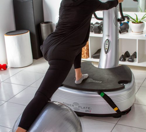 A Power Plate Center member working out on Power Plate my7