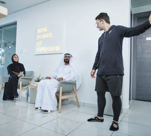 A trainer welcoming an Emirati couple